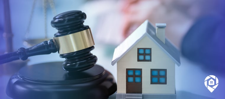 Gavel and small house model representing the legal authority of an attorney in fact to sign real estate documents.