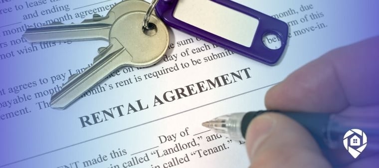 Veteran signing a rental agreement after using a VA loan to invest in real estate.