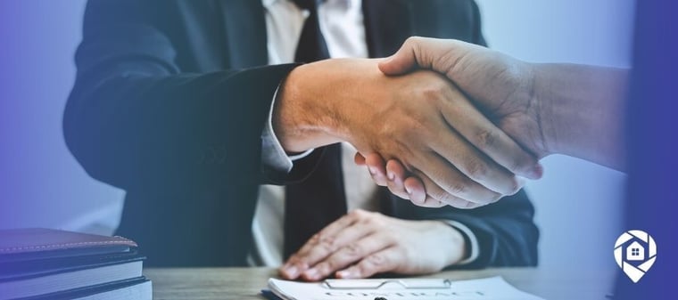 Wholesale property contract signing between investor and seller.