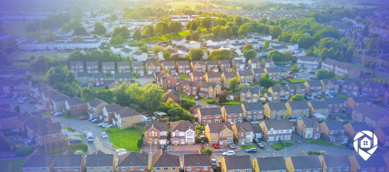 Aerial view of a revitalized neighborhood representing Dwayne Ransifer’s mission to buy back the block through real estate investment.