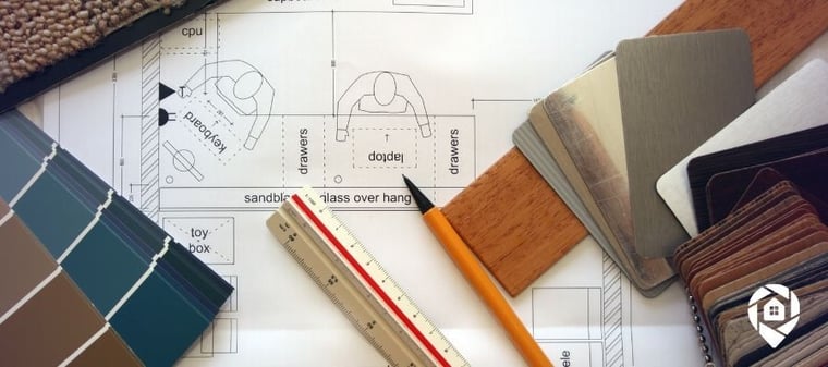 Real estate renovation planning with design samples and materials—representing property flipping strategies.