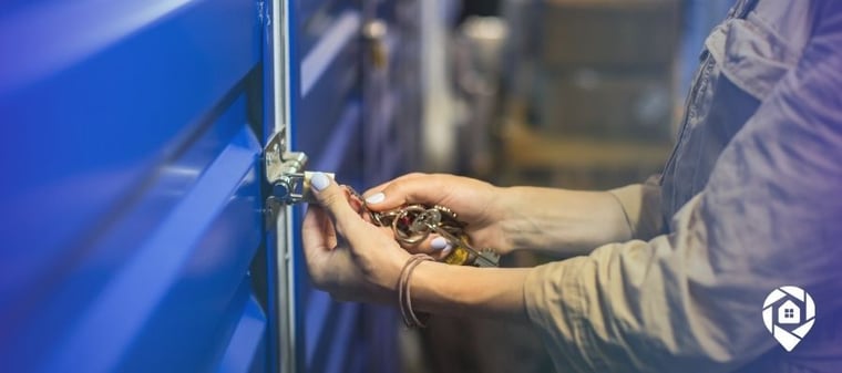 Person unlocking a self-storage unit, representing passive income and real estate investment strategy by Matthew Ricardella.