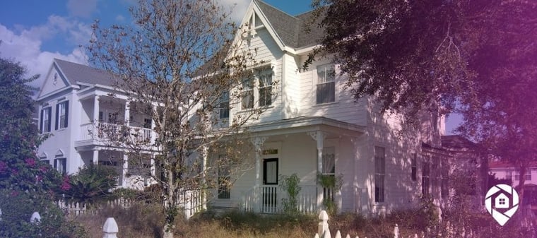 House in decent condition with overgrown lawn and weeds to represent How to Find Houses in Foreclosure: 5 Easiest Methods blog banner.