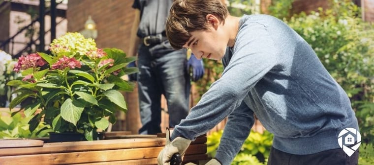 Teen learning real estate by working on home improvement project.