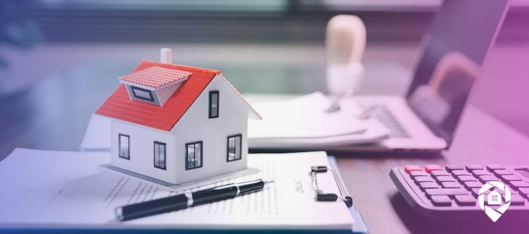 A house on top of contracts representing finding a buyer for property deals.