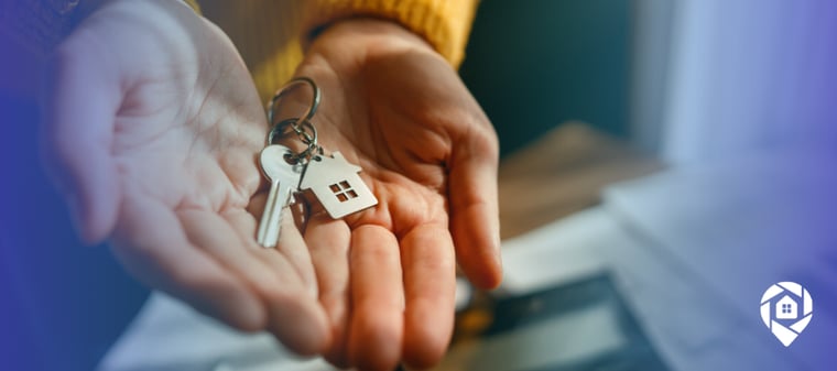 Homebuyer holding house keys, representing off-market deals and direct mail lead generation.