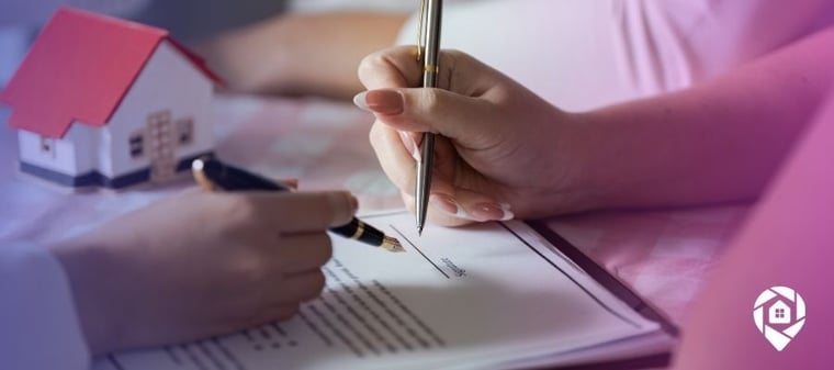 An investor and a homeowner going over a contract for an owner carry deal.