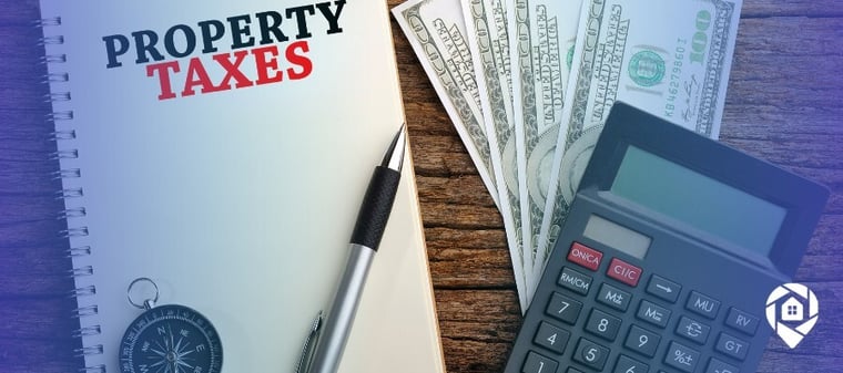 Notebook labeled property taxes next to cash and a calculator, representing property tax in Sacramento CA